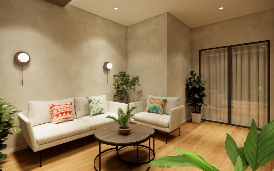 Casual lounge — warm timber flooring, textured plaster walls and a soft seating cluster around a round coffee table.