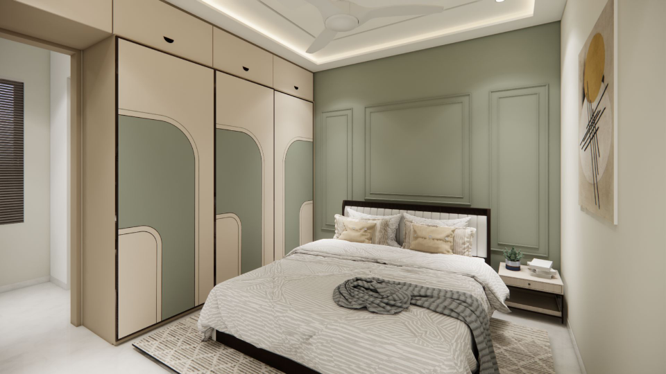 Guest bedroom — sage walls with arched wardrobe panels and classical wall mouldings.