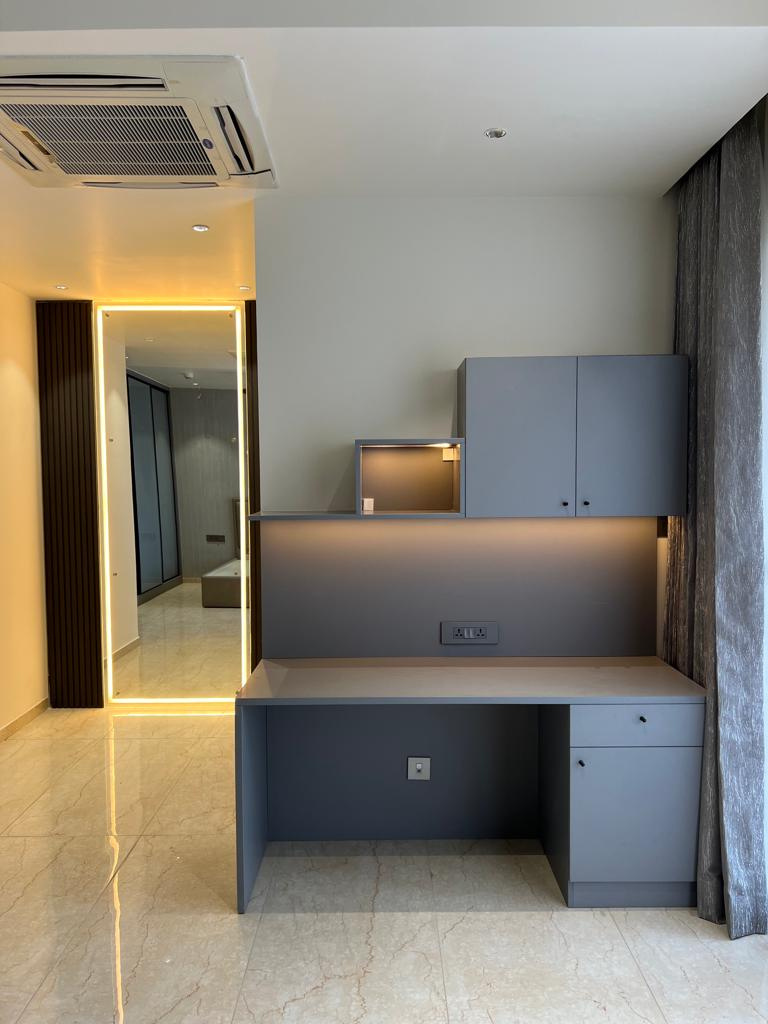 Vanity — a tailored composition with mirror and warm task lighting.